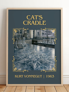 Cat's Cradle Classic Book Art Print by Kurt Vonnegut – framed print leaning on a wooden floor