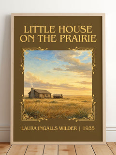 Little House on the Prairie Classic Book Art Print by L. Wilder – framed print leaning on a wooden floor