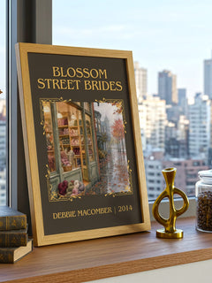 Blossom Street Brides Classic Book Art Print by Debbie Macomber – framed print on a city-view windowsill