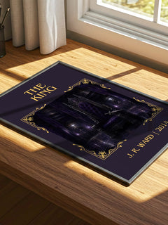 The King Classic Book Art Print by J. R. Ward – print on a sunlit desk