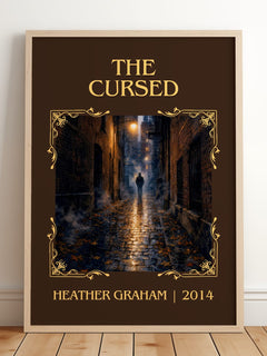 The Cursed Classic Book Art Print by Heather Graham – framed print leaning on a wooden floor