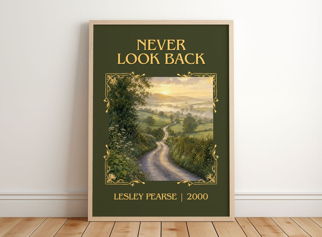 Never Look Back Classic Book Art Print by Lesley Pearse – framed print leaning on a wooden floor