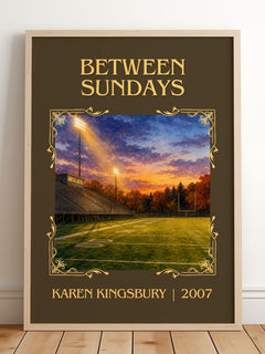 Between Sundays Classic Book Art Print by Karen Kingsbury – framed print leaning on a wooden floor