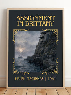 Assignment in Brittany Classic Book Art Print by Helen MacInnes – framed print leaning on a wooden floor