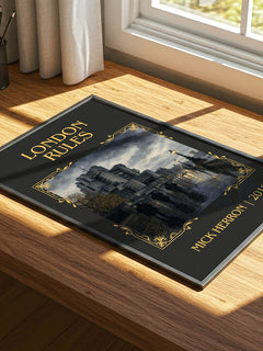 London Rules Classic Book Art Print by Mick Herron – print on a sunlit desk