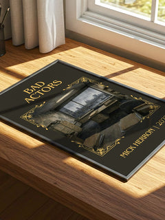 Bad Actors Classic Book Art Print by Mick Herron – print on a sunlit desk