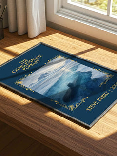 The Charlemagne Pursuit Classic Book Art Print by Steve Berry – print on a sunlit desk