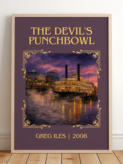 The Devil's Punchbowl Classic Book Art Print by Greg Iles – framed print leaning on a wooden floor