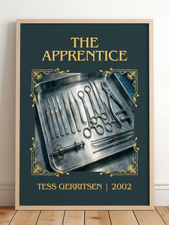 The Apprentice Classic Book Art Print by Tess Gerritsen – framed print leaning on a wooden floor