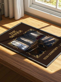 The Sinner Classic Book Art Print by Tess Gerritsen – print on a sunlit desk