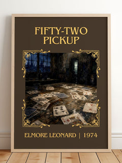 Fifty-Two Pickup Classic Book Art Print by Elmore Leonard – framed print leaning on a wooden floor