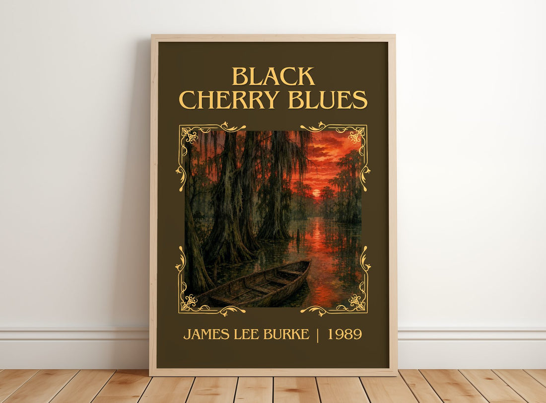 Black Cherry Blues Classic Book Art Print by James Lee Burke – framed print leaning on a wooden floor