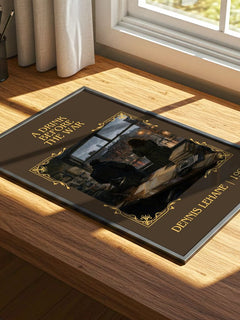 A Drink Before the War Classic Book Art Print by Dennis Lehane – print on a sunlit desk