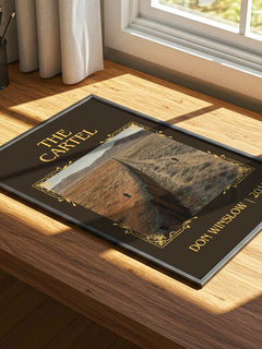 The Cartel Classic Book Art Print by Don Winslow – print on a sunlit desk