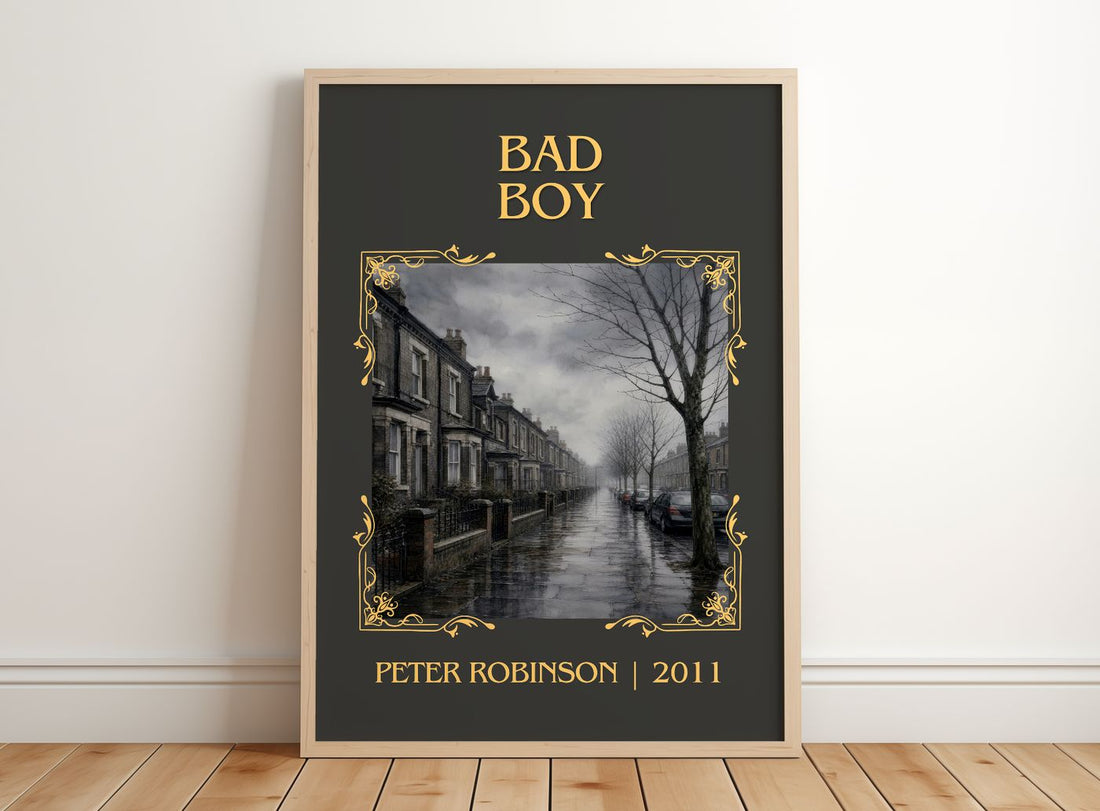 Bad Boy Classic Book Art Print by Peter Robinson – framed print leaning on a wooden floor