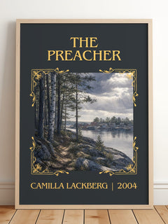 The Preacher Classic Book Art Print by Camilla Läckberg – framed print leaning on a wooden floor