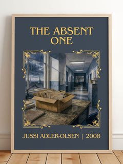 The Absent One Classic Book Art Print by Jussi Adler-Olsen – framed print leaning on a wooden floor