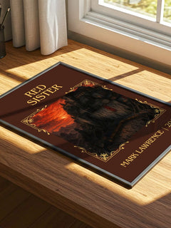 Red Sister Classic Book Art Print by Mark Lawrence – print on a sunlit desk