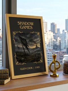 Shadow Games Classic Book Art Print by Glen Cook – framed print on a city-view windowsill