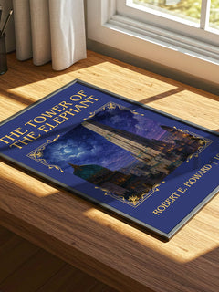 The Tower of the Elephant Classic Book Art Print by Robert E. Howard – print on a sunlit desk