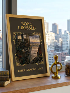Bone Crossed Classic Book Art Print by Patricia Briggs – framed print on a city-view windowsill