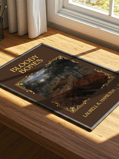 Bloody Bones Classic Book Art Print by Laurell K. Hamilton – print on a sunlit desk