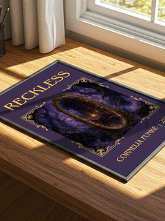 Reckless Classic Book Art Print by Cornelia Funke – print on a sunlit desk