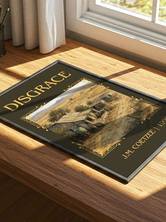 Disgrace Classic Book Art Print by J.M. Coetzee – print on a sunlit desk