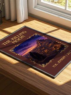 The Killing Moon Classic Book Art Print by N.K. Jemisin – print on a sunlit desk
