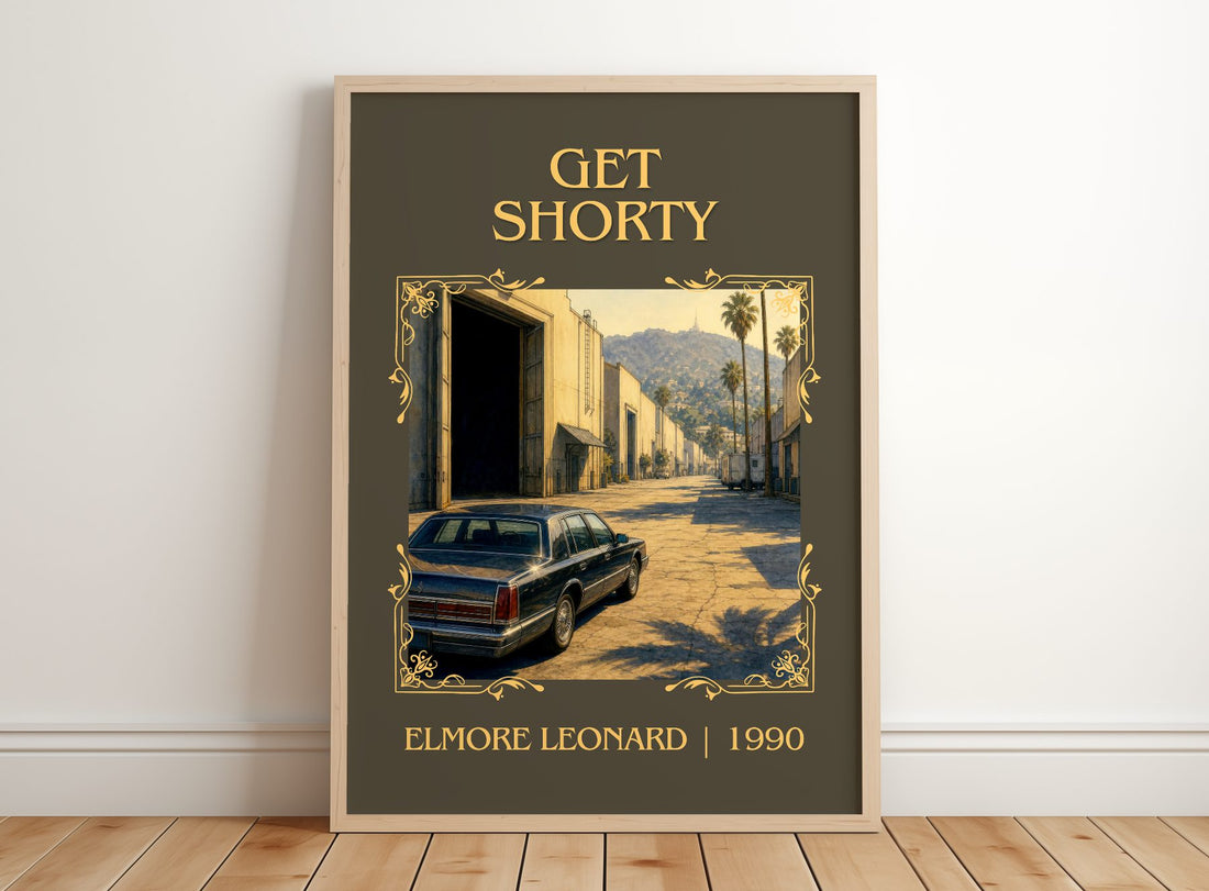 Get Shorty Classic Book Art Print by Elmore Leonard – framed print leaning on a wooden floor