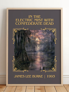 In the Electric Mist with Confederate Dead Classic Book Art Print by James Lee Burke – framed print leaning on a wooden floor