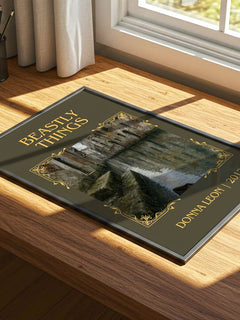 Beastly Things Classic Book Art Print by Donna Leon – print on a sunlit desk