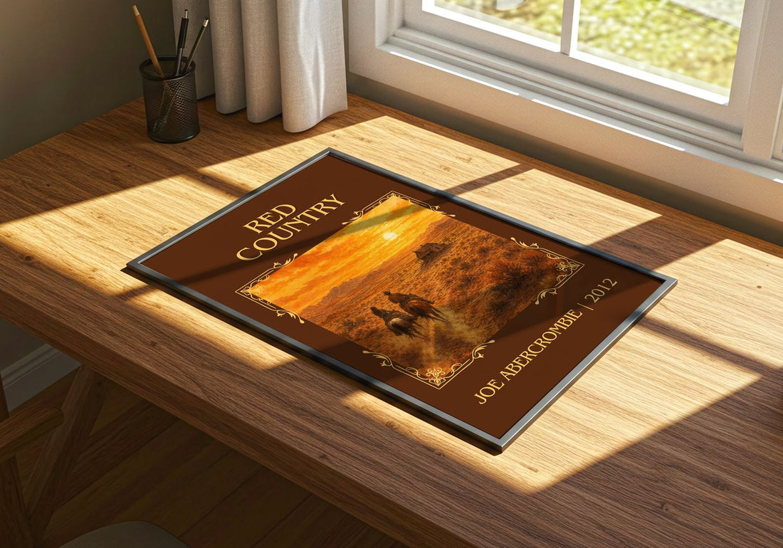 Red Country Classic Book Art Print by Joe Abercrombie – print on a sunlit desk