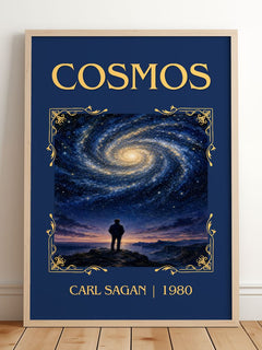 Cosmos Classic Book Art Print by Carl Sagan – framed print leaning on a wooden floor