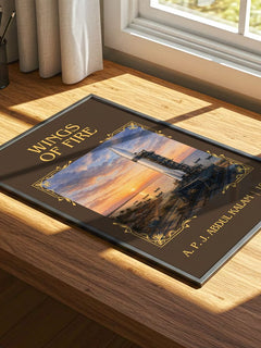 Wings of Fire Classic Book Art Print by A. P. J. Abdul Kalam – print on a sunlit desk