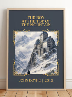 Boy at the Top of the Mountain Classic Book Art Print by John Boyne – framed print leaning on a wooden floor