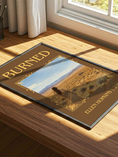 Burned Classic Book Art Print by Ellen Hopkins – print on a sunlit desk
