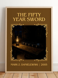The fifty year sword Classic Book Art Print by Mark Z. Danielewski – framed print leaning on a wooden floor