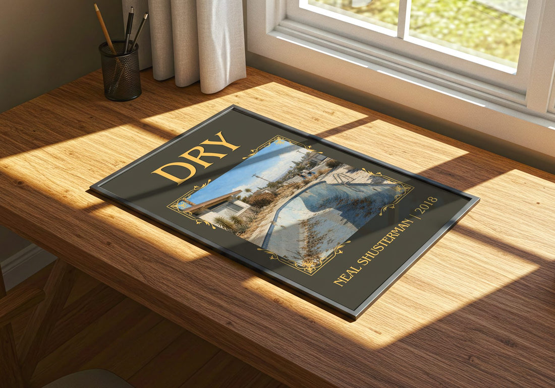 Dry Classic Book Art Print by Neal Shusterman – print on a sunlit desk