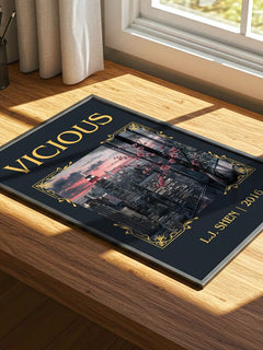 Vicious Classic Book Art Print by L.J. Shen – print on a sunlit desk
