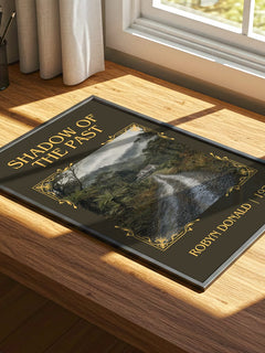 Shadow of the Past Classic Book Art Print by Robyn Donald – print on a sunlit desk