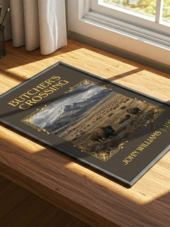 Butcher's Crossing Classic Book Art Print by John Williams – print on a sunlit desk