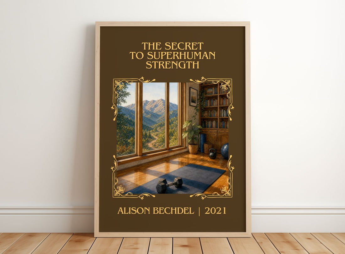 Secret to Superhuman Strength Classic Book Art Print by Alison Bechdel – framed print leaning on a wooden floor