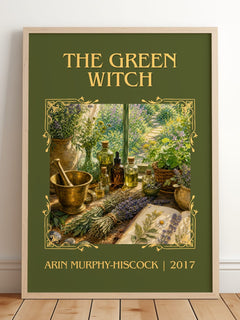 The Green Witch Classic Book Art Print by Arin Murphy-Hiscock – framed print leaning on a wooden floor