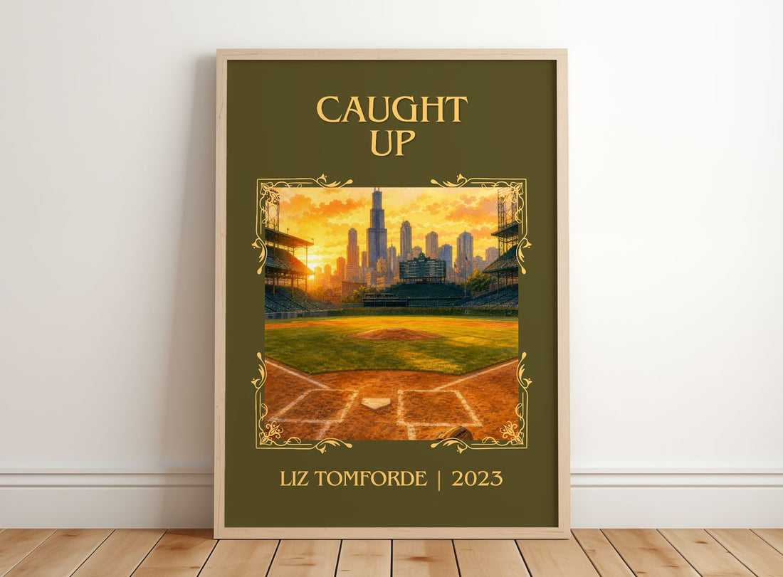 Caught Up Classic Book Art Print by Liz Tomforde – framed print leaning on a wooden floor
