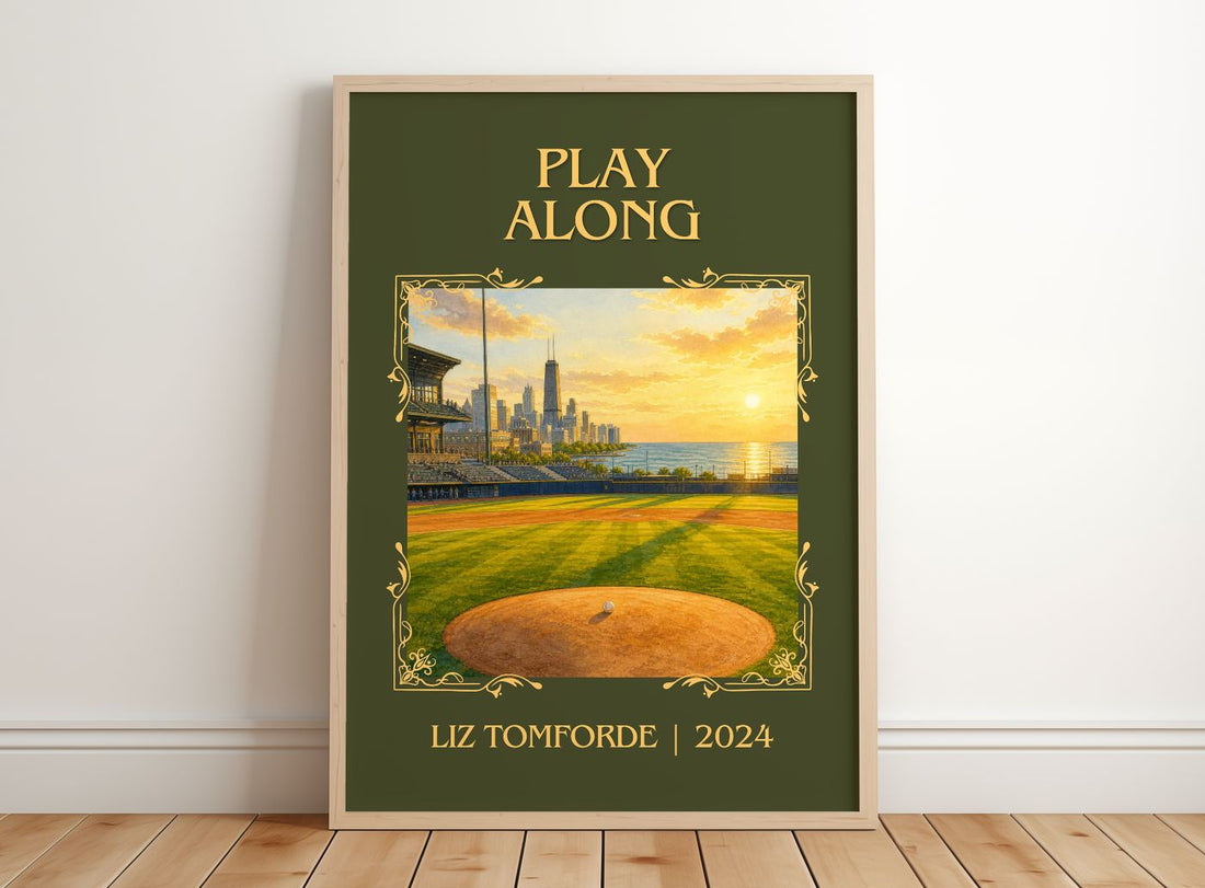 Play Along Classic Book Art Print by Liz Tomforde – framed print leaning on a wooden floor