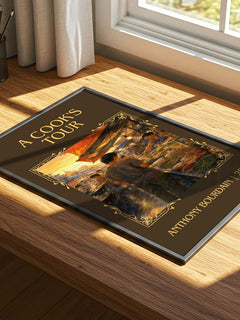 A Cook's Tour Classic Book Art Print by Anthony Bourdain – print on a sunlit desk