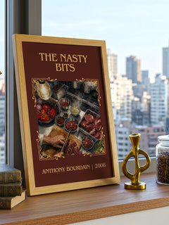 The Nasty Bits Classic Book Art Print by Anthony Bourdain – framed print on a city-view windowsill