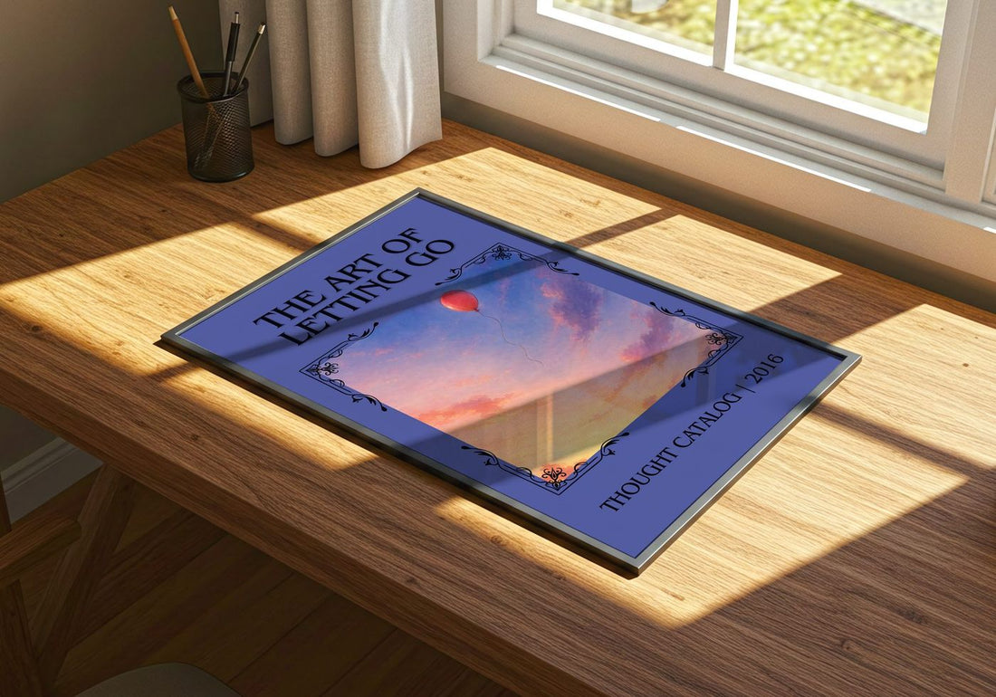 The Art of Letting Go Classic Book Art Print by Thought Catalog – print on a sunlit desk