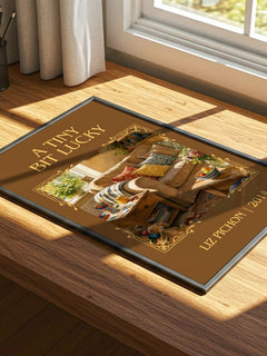 A Tiny Bit Lucky Classic Book Art Print by Liz Pichon – print on a sunlit desk